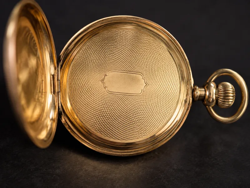 Close-up showing where a hallmark is usually found: inside a watch case